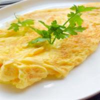 Plain Omelet · Beaten eggs that are folded over a filling.