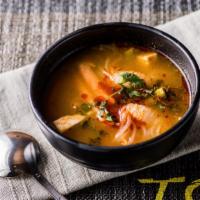 Spicy Thai Lemongrass Soup · Shrimp ,scallops , Kani , rice noodles,and assorted mix vegetables in tom-yum broth