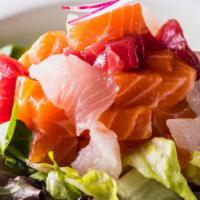 Sashimi Salad · Tuna, white tuna & Salmon on mixed greens with soy vinaigrette