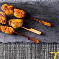 Chicken Satay (3Pcs) · Malaysian style grilled chicken served with spicy peanut dipping sauce