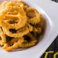 Crispy Calamari · Breaded & crispy fried calamari rings served with lemongrass sweet chili sauce