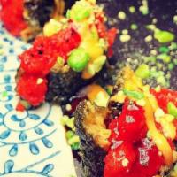 Crispy Rice Spicy Tuna · Deep fried sushi rice with guacamole & topped with chopped toro with truffle oil & wasabi sa...