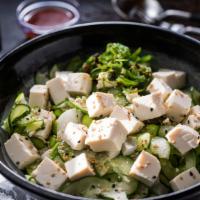 Vegetable Delight Bowl · Organic tofu, edamame, onion, seaweed salad, cucumber, sesame seeds,  with bed of sushi rice...