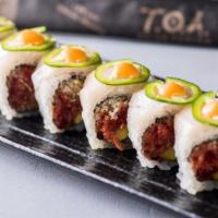 Oyster Bay Roll · Inside: Spicy tuna & Avocado . Outside: Sliced yellowtail jalapeno w spicy mayo