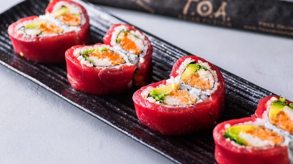 Sweet Heart Roll · Inside: Spicy salmon, kani, seaweed salad & avocado . Outside: Wrapped with Tuna