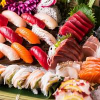 Sushi & Sashimi Combo (For 2) · 8 Pcs assorted Sushi & 18 Pcs sashimi with a spicy tuna roll & an angel hair roll