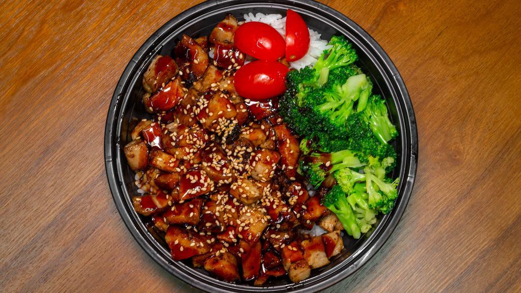 Roast Pork Rice Box · Roast Pork Paired with Jalapeno, Cherry Tomatoes, Sesame Seeds, and Eel Sauce.