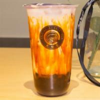 Brown Sugar Zang Zang Milk · Brown Sugar Molasses poured over tapioca pearls and swirled around the cup, comes with Almon...