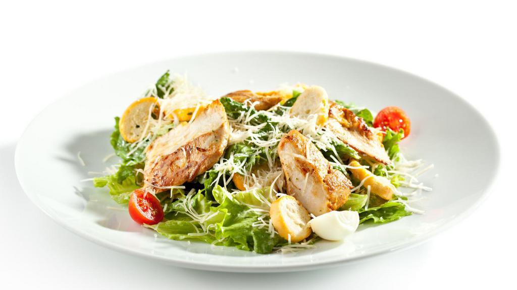 Chicken Caesar Salad · Juicy grilled chicken, romaine, croutons, parmesan cheese, and mixed greens.