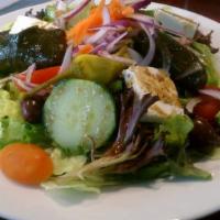Small Dinner Salad · Mixed greens, red onions, tomatoes, cucumbers, shredded carrots, olives, Gorgonzola cheese a...