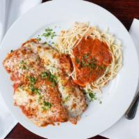 Chicken Cutlet Parmesan · Fresh chicken breast with rich tomato sauce and melted mozzarella cheese.