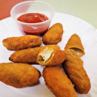 Jalapeno Poppers  (New) 8Pcs · Fresh Jalapeno are sliced in Half and filled with a rich creamy cheese filling and baked unt...