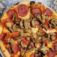 Pepperoni + Mushroom · Pepperoni, sliced Mushroom and Shredded Cheese with our Famous Singas Pizza Sauce.