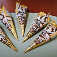 Super Sundae  Cone · Vanilla flavored ice cream with chocolate flavored toppings & peanuts in a Sugar Cone