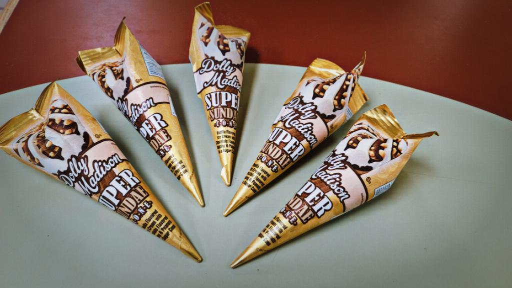 Super Sundae  Cone · Vanilla flavored ice cream with chocolate flavored toppings & peanuts in a Sugar Cone