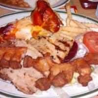 Bandeja Mario · Mario's special platter with grilled steak, pork loin, crackling, 1/4 chicken, French fries,...