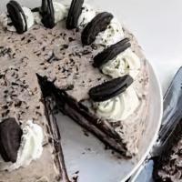 Classic Oreo Cake · This Oreo Cake recipe is to die for! A moist chocolate cake full of Oreo icing. Definitely a...