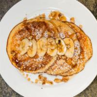 Banana And Walnut Pancakes · Served with Vermont maple syrup & butter.