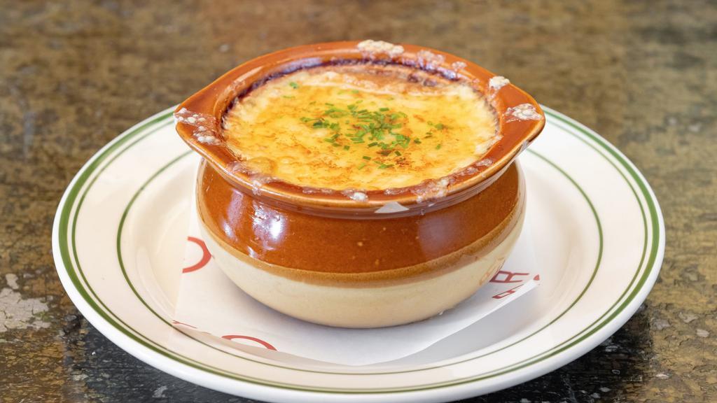 French Onion Soup · Served with baguette croûtons & gruyère