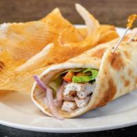 Grilled Chicken Wrap · Grilled chicken wrapped in pita with Lettuce, tomato, onions, yogurt sauce & Moroccan Chips.