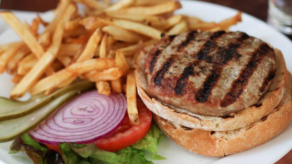 Turkeyburger · 8 oz Dartagnan's hormone and antibiotic free ground turkey. Served with lettuce, tomato, onion, pickles & french fries.
