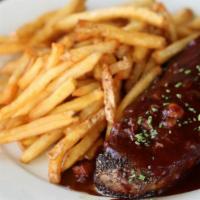 Steak Au Poivre · 12 oz Grass Fed NY Strip w/ Fries & peppercorn-brandy sauce