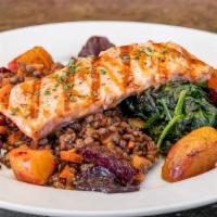 Grilled Salmon · Served with French lentil salad, sautéed spinach, roasted beets & pomegranate vinaigrette.