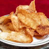 Moroccan Chips · House made potato chips spiced with Moroccan herbs (Cayenne pepper, cinnamon, cumin & corian...
