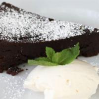 Flowerless Chocolate Cake · Served with whipped cream.
