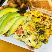 Fiesta Omelette · Saute onions, fresh jalapenos, chopped tomatoes, cilantro and topped with avocado.