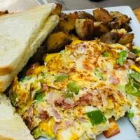 Western Omelette · Cheddar cheese, ham, peppers and onions.