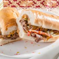 Philly Cheesesteak · American cheese, peppers and onions served on a wedge.