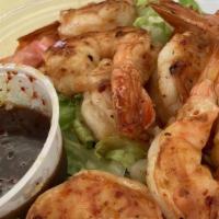 Hawaiian Shrimp Salad  · Hawaiian shrimp,romaine lettuce,tomatoes,cranberries & hawaiian ono sauce