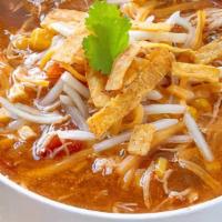Tortilla Soup · Chicken tomato soup with crushed corn tortillas and avocados