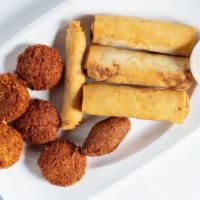 Appetizer Combo · Falafel, moroccan cigars, Chicken roll & Kibbeh.