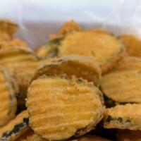 Fried Pickles · Another favorite added to our menu! Try our freshly battered fried pickles! Comes with a spi...