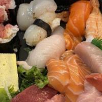 Chirashi-Sushi · Assorted raw fish on sushi rice in a box.