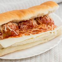Meatball Parmigiana · Italian beef/pork blended meatballs smothered in a zesty marinara sauce with melted provolon...