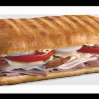 Ultimate Club · Slow-cured ham, oven-roasted turkey, crisp bacon, swiss, tomatoes, and onion with peppercorn...