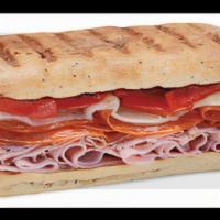 The Sicilian · Ham, salami, prosciuttini and provolone, served with roasted red peppers and creamy Italian ...