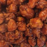 Buffalo Mini Bites · Our mini bites tossed in your choice of one of our wing sauces.

With choice of one side & r...