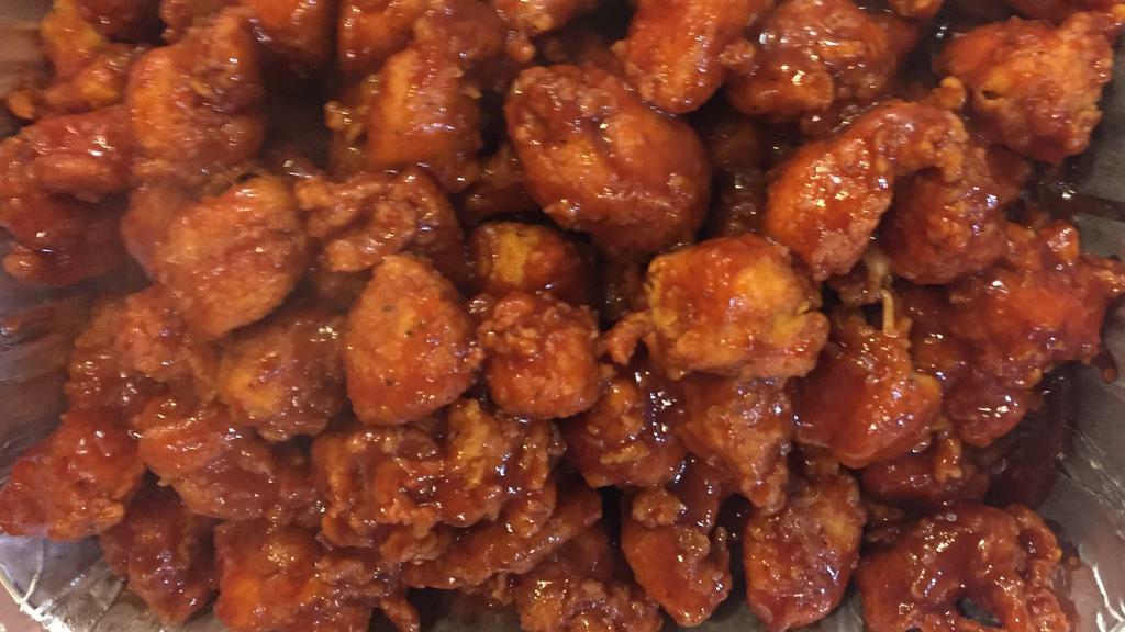 Buffalo Mini Bites · Our mini bites tossed in your choice of one of our wing sauces.

With choice of one side & regular can of soda