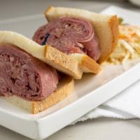 Corned Beef Sandwich · Served with a pickle and on rye or wrap.