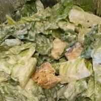Caesar Salad · Crisp romaine, lettuce, homemade croutons, grated cheese and Caesar dressing.