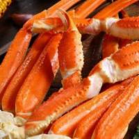 Snow Crab Legs · 1 lb fresh snow crab legs boil tossed in flavorful seasoning and spice of choice. Served wit...
