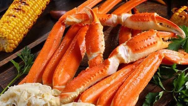 Snow Crab Legs · 1 lb fresh snow crab legs boil tossed in flavorful seasoning and spice of choice. Served with 1 corn and 1 potato