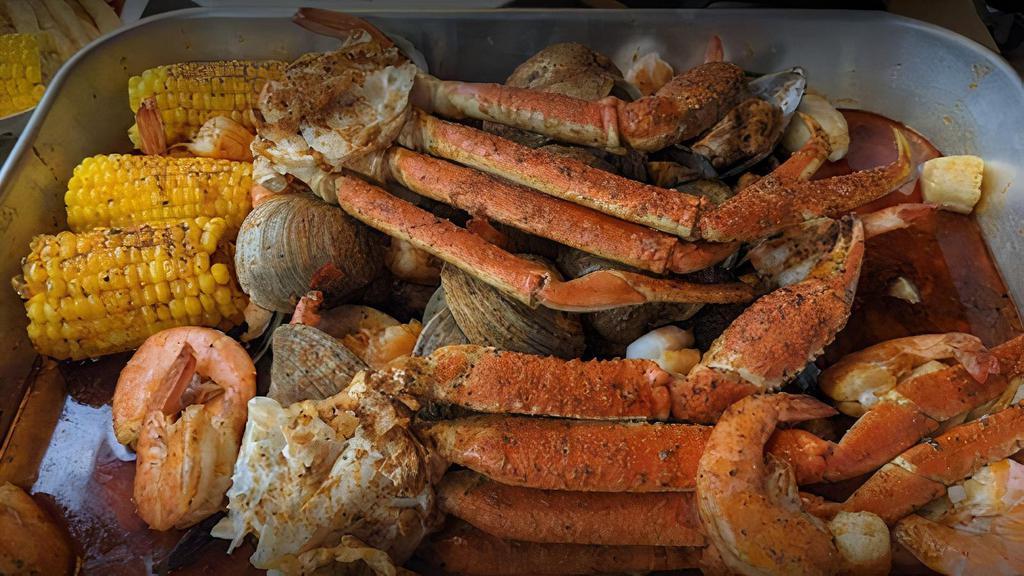King Crab Special · 1 LB King Crab, 1 LB shrimp, 1 LB mussels, 1 LB blue crab, 1/2 LB sausage, 4 corns & 4 potatoes