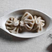 Khinkali · Georgian dumplings (three per serving). Choose your filling.