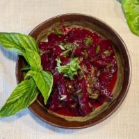 Beets In Tkemali Sauce  · Boiled fresh beets dosed in homemade Tkemali (Georgian plum sauce), garnished with Cilantro