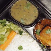 Vegetable Curry Platter · Serves with veggies Curry, rice, lentils and some salad.